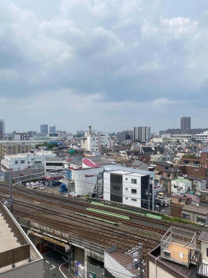 台東区寝室4つと広々吹き抜けリビングのメゾネットタイプのお家 Tokio