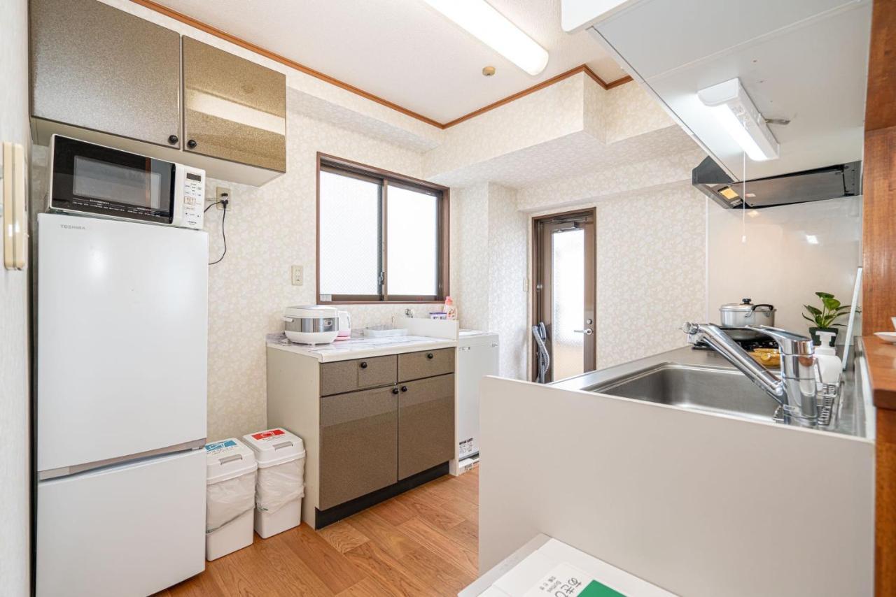 台東区寝室4つと広々吹き抜けリビングのメゾネットタイプのお家 Apartamento Tokio